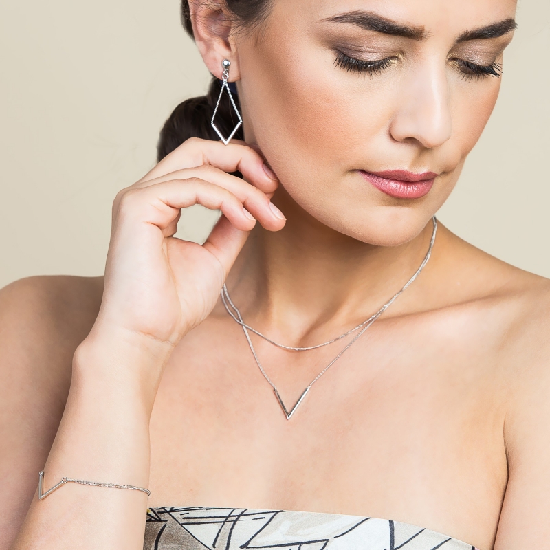 Gift: Silver earrings and bracelet  V for Victory