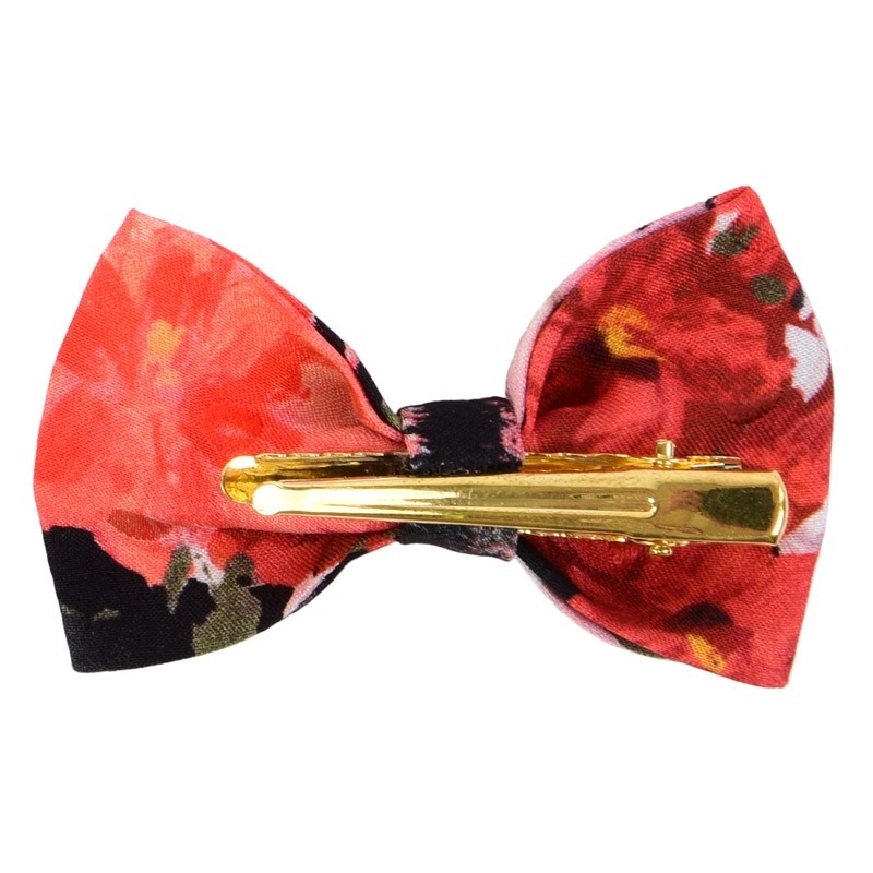 Coral flowers on black bow