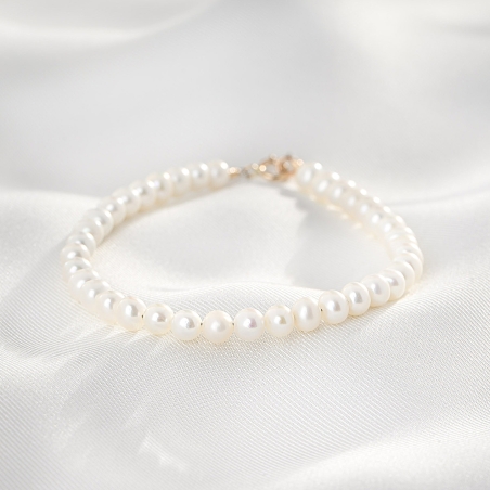 Bracelet Essencial Line pearls 4.5 mm, 14K gold closure